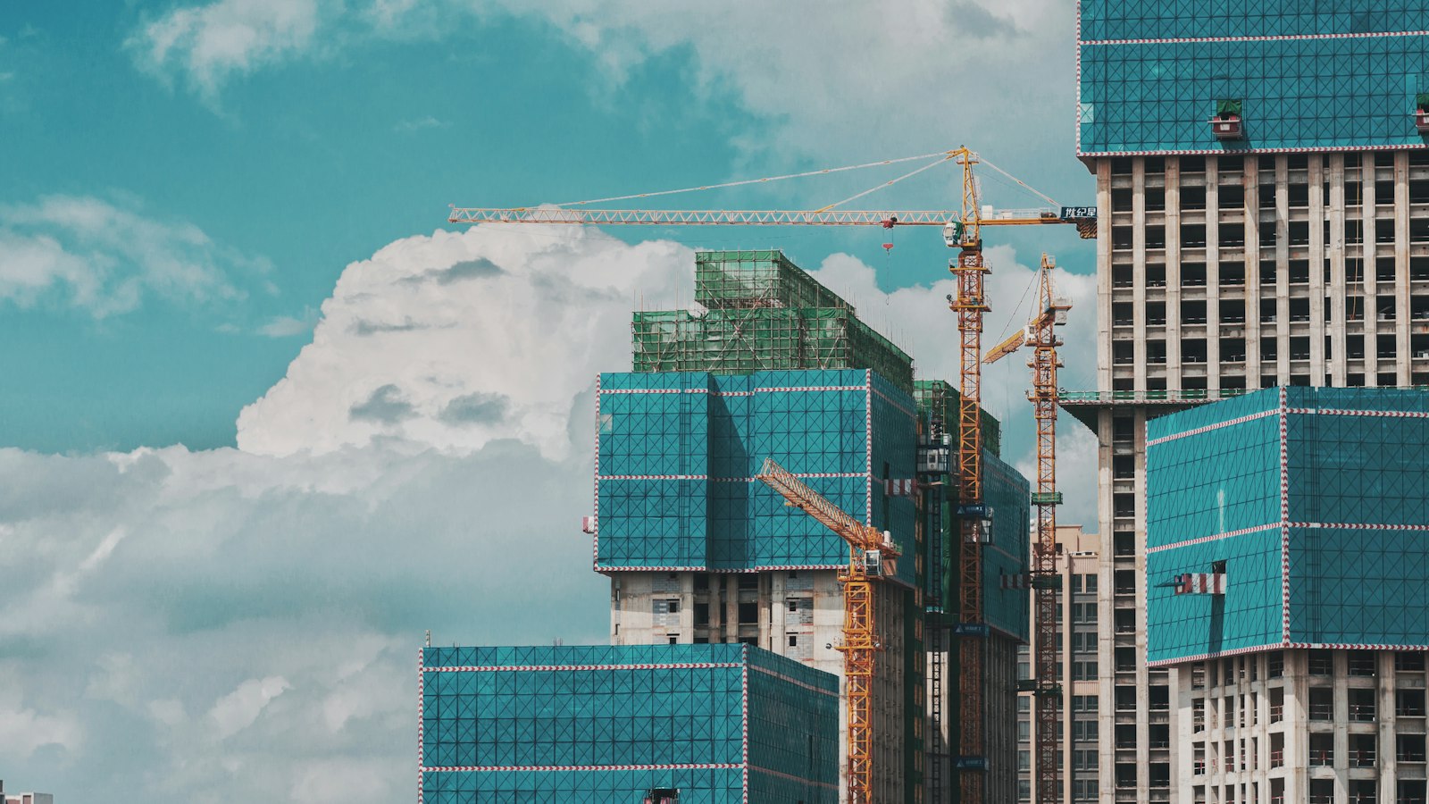 High-rise construction with tower cranes